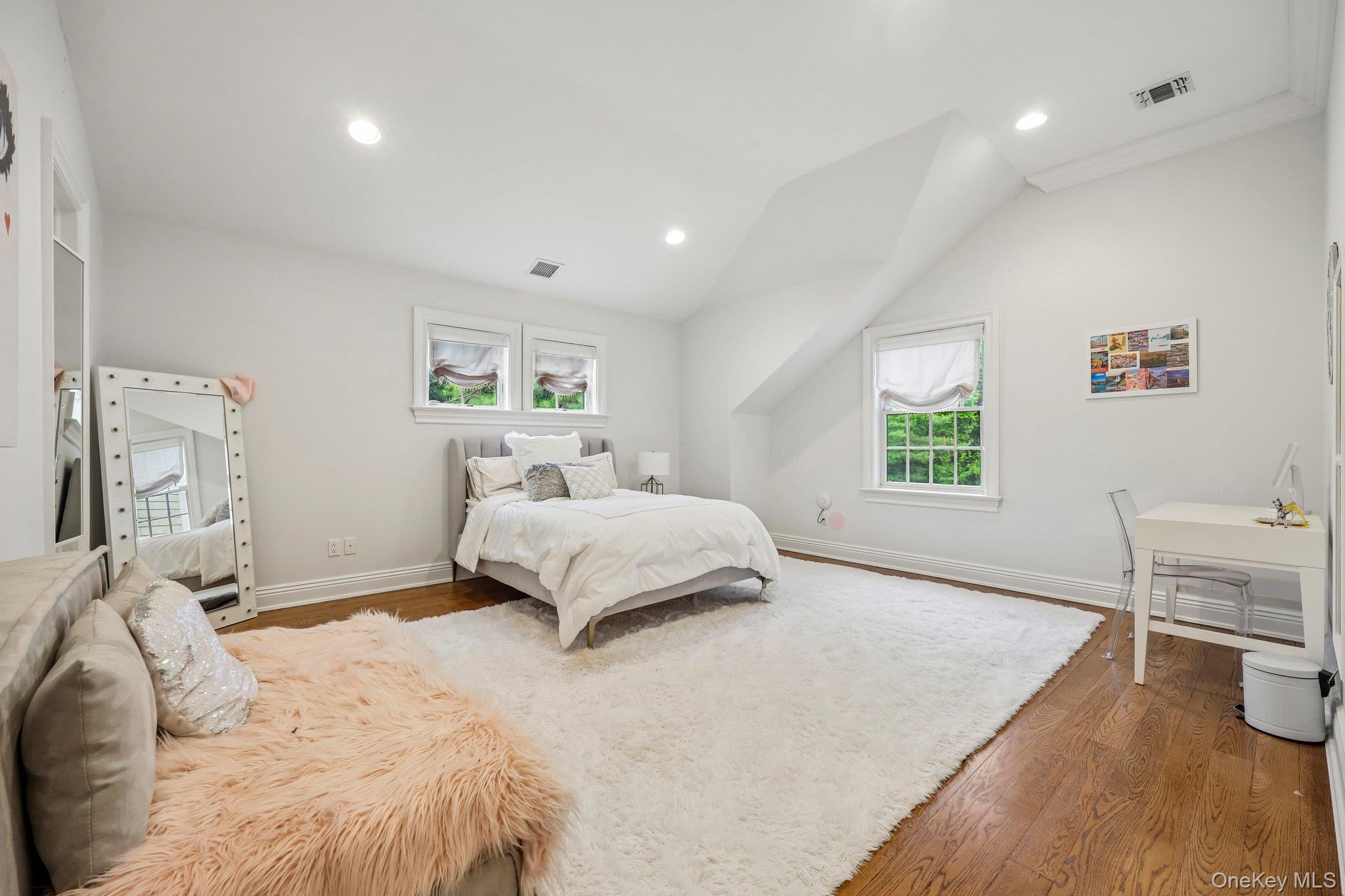 5 Mill Road Lloyd Harbor, NY 11743 - Photo 31 of 49 a bedroom with a bed and a couch