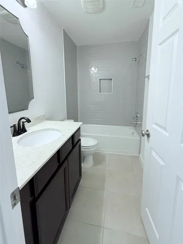 a view of kitchen and living room with furniture