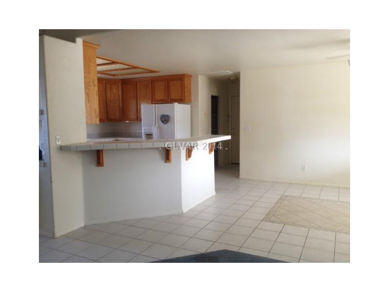 Kitchen. Large Breakfast Bar separates the Kitchen from the Dining Room