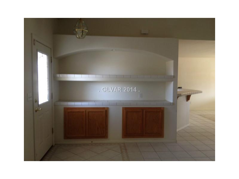 381 Big Five Road Pahrump, NV 89048 - Photo 10 of 35 Den. More built in cabinets at entry way.