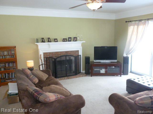 2342 Millbrook Court Rochester, MI 48306 - Photo 12 of 36 Family Room with Natural Wood Fireplace