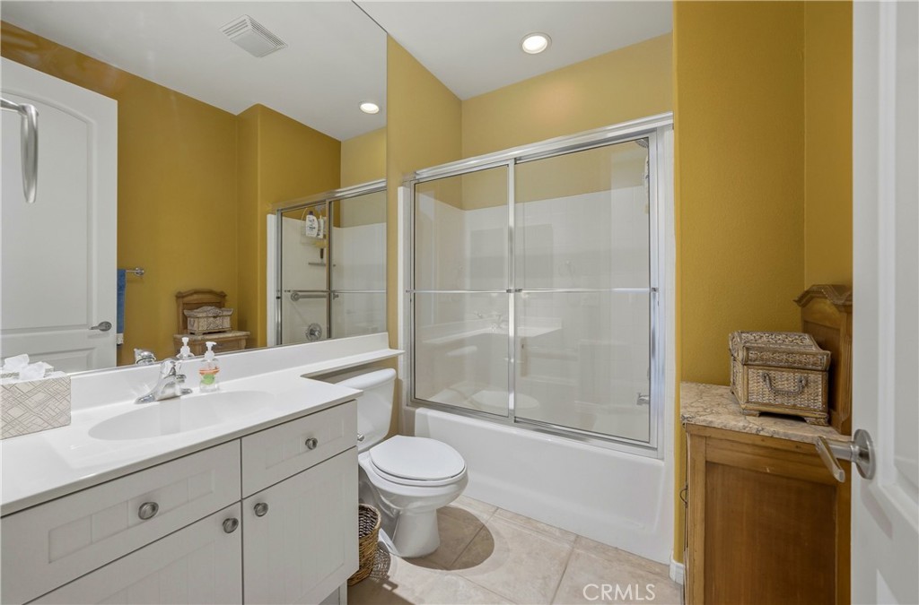 241 Via Martelli Rancho Mirage, CA 92270 - Photo 17 of 37 a bathroom with a sink mirror vanity and toilet