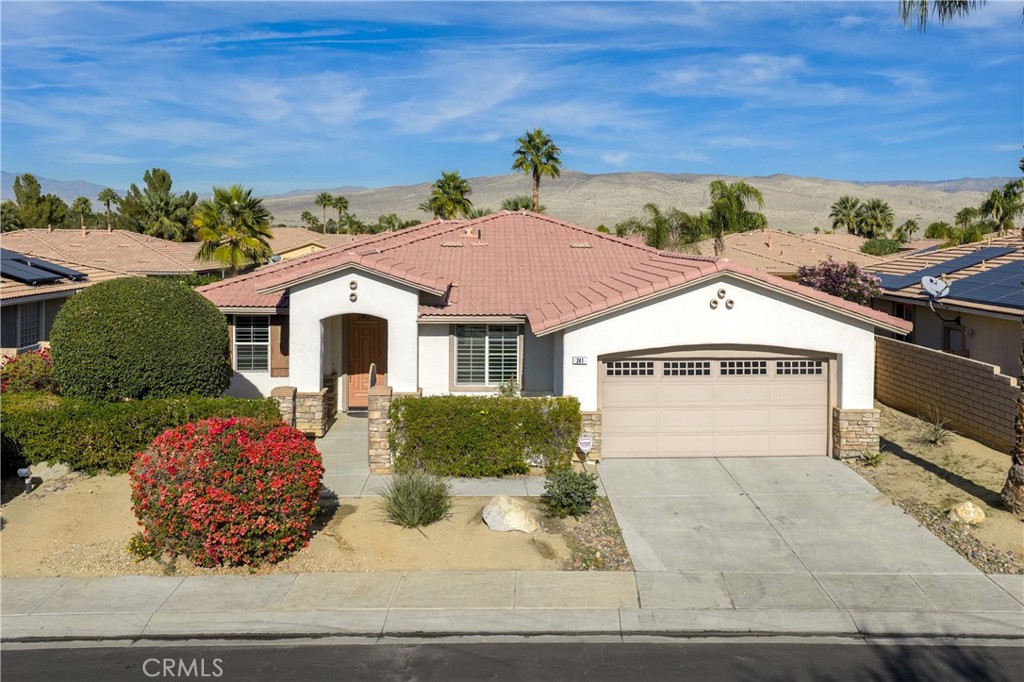241 Via Martelli Rancho Mirage, CA 92270 - Photo 2 of 37 a view of house with yard