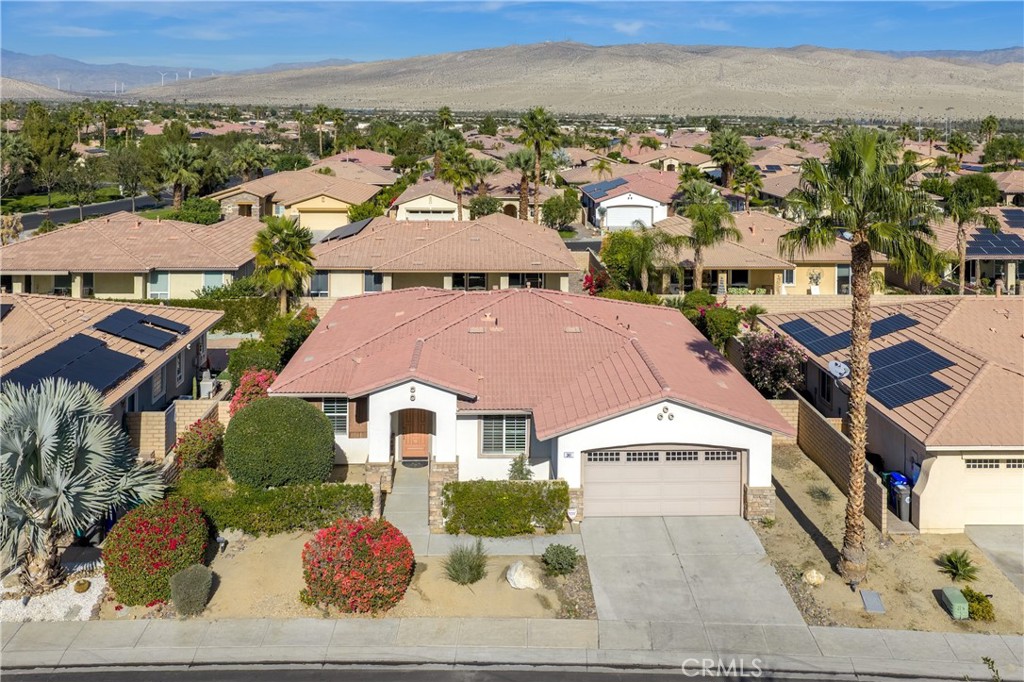 241 Via Martelli Rancho Mirage, CA 92270 - Photo 4 of 37 an aerial view of multiple houses with a city view