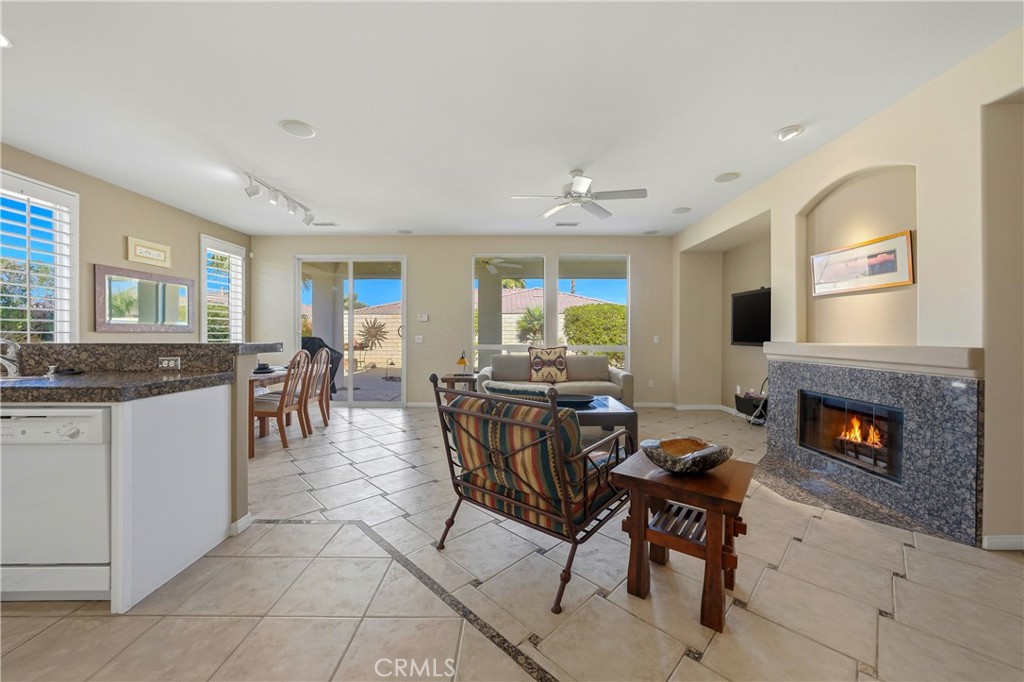 241 Via Martelli Rancho Mirage, CA 92270 - Photo 9 of 37 a view of a dining room with furniture window and wooden floor