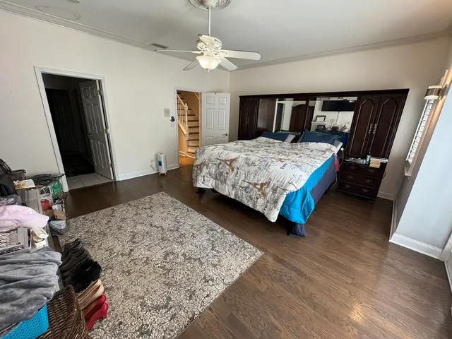 a bathroom with a tub a sink and a shower