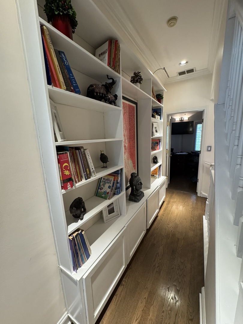 1413 South Prairie Avenue Chicago, IL 60605 - Photo 22 of 29 a view of walk in closet with clothes and shoes