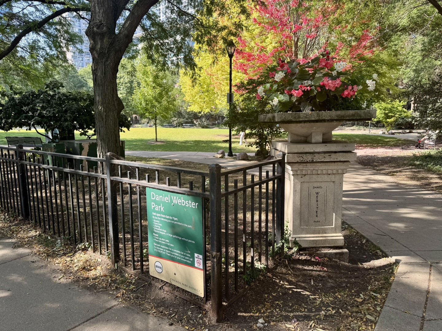 1413 South Prairie Avenue Chicago, IL 60605 - Photo 28 of 29 a view of a street with wooden fence next to a large tree