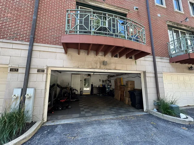 a kitchen with stainless steel appliances a refrigerator a stove a sink dishwasher and a oven with wooden floor