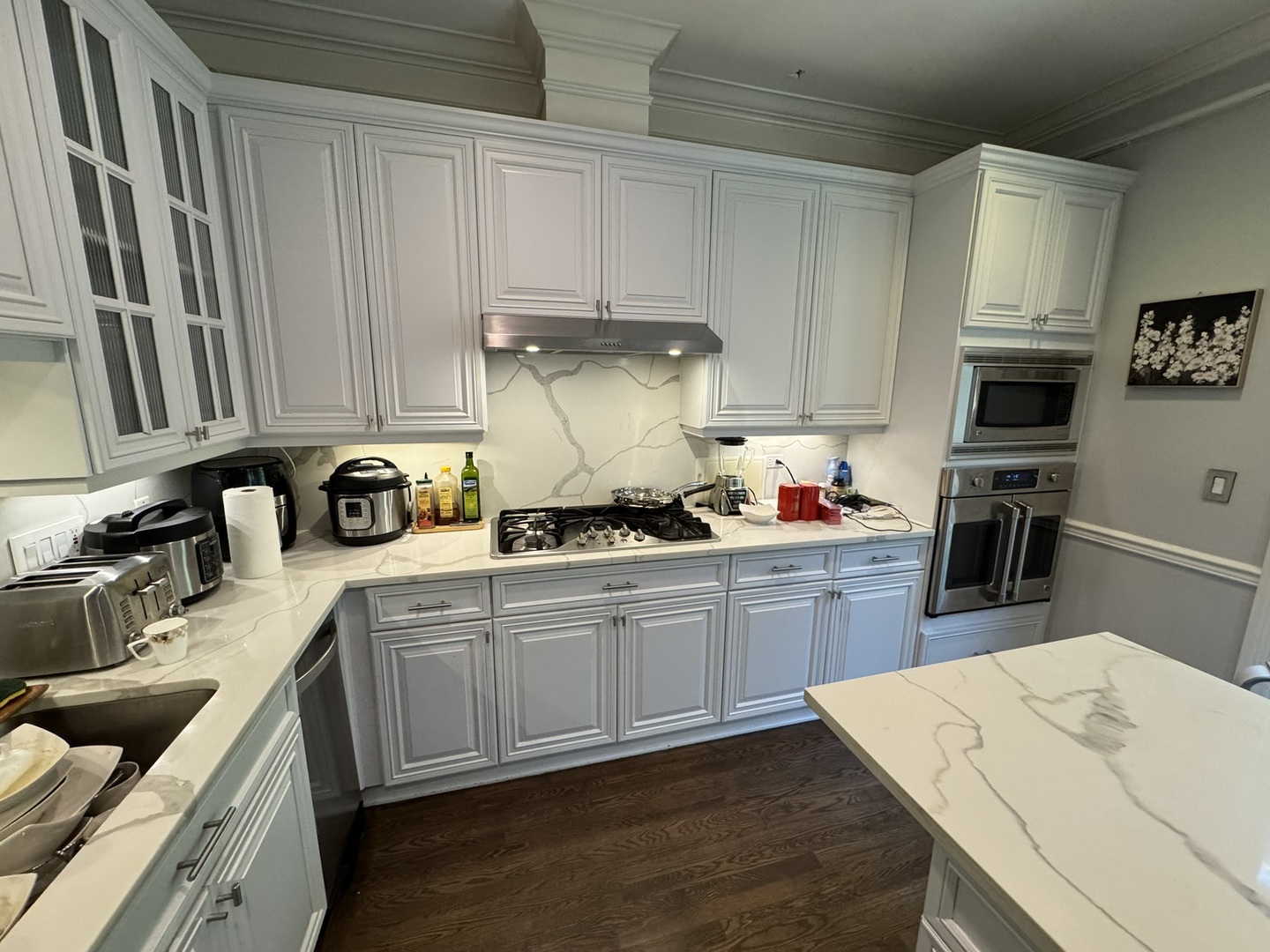 1413 South Prairie Avenue Chicago, IL 60605 - Photo 8 of 29 a kitchen with kitchen island sink stove and cabinets