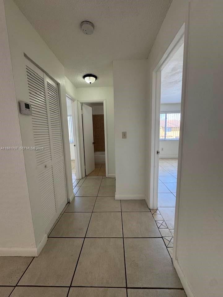 15480 Southwest 82nd Lane, Unit 228 Miami, FL 33193 - Photo 11 of 17 Hall/ AC unit/ Hall closet
