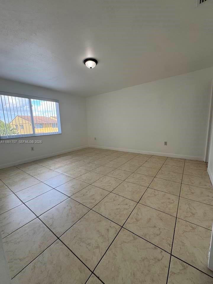 15480 Southwest 82nd Lane, Unit 228 Miami, FL 33193 - Photo 9 of 17 First bedroom