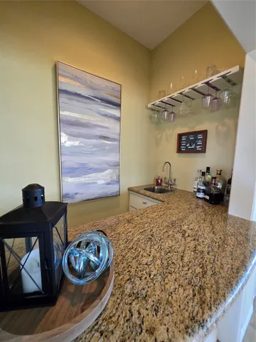 a living room with furniture and rug