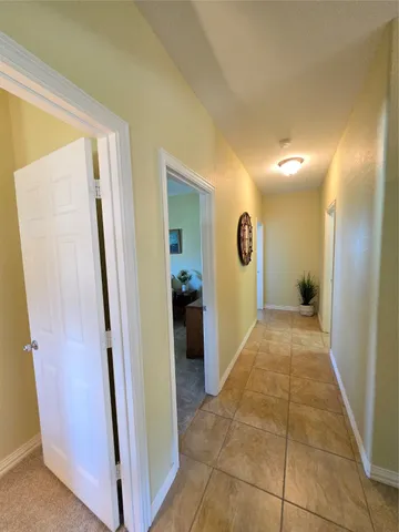 a view of entryway with a hallway