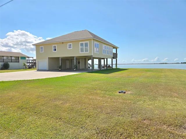 a view of a house with a ocean view