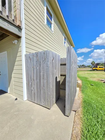 a backyard of a house with a yard