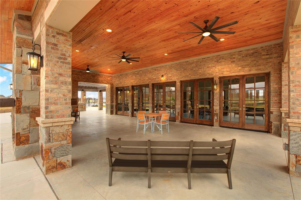 11456 Wulstone Road Fort Worth, TX 76052 - Photo 9 of 11 a lobby with furniture and outdoor space