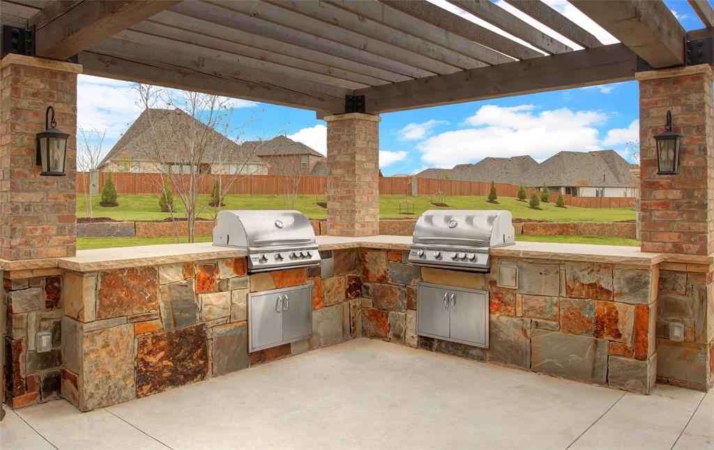 11456 Wulstone Road Fort Worth, TX 76052 - Photo 10 of 11 a view of a kitchen with a stove