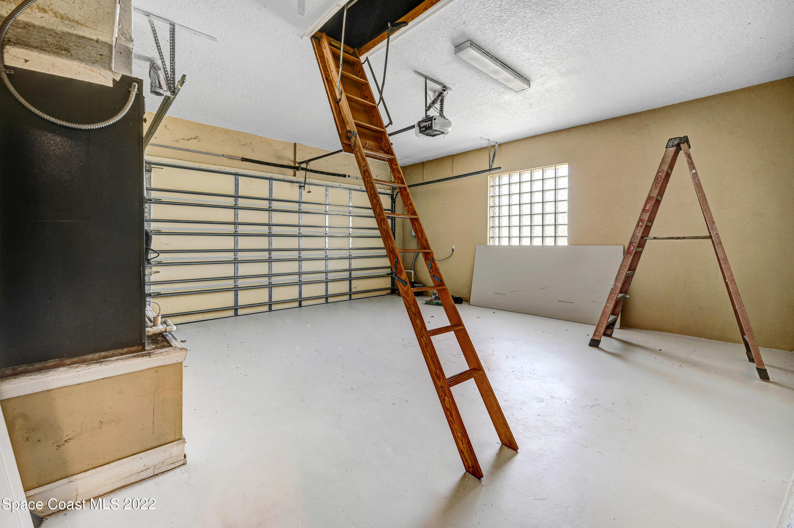 2185 Windbrook Drive Palm Bay, FL 32909 - Photo 19 of 61 a view of a hardwood floor and staircase