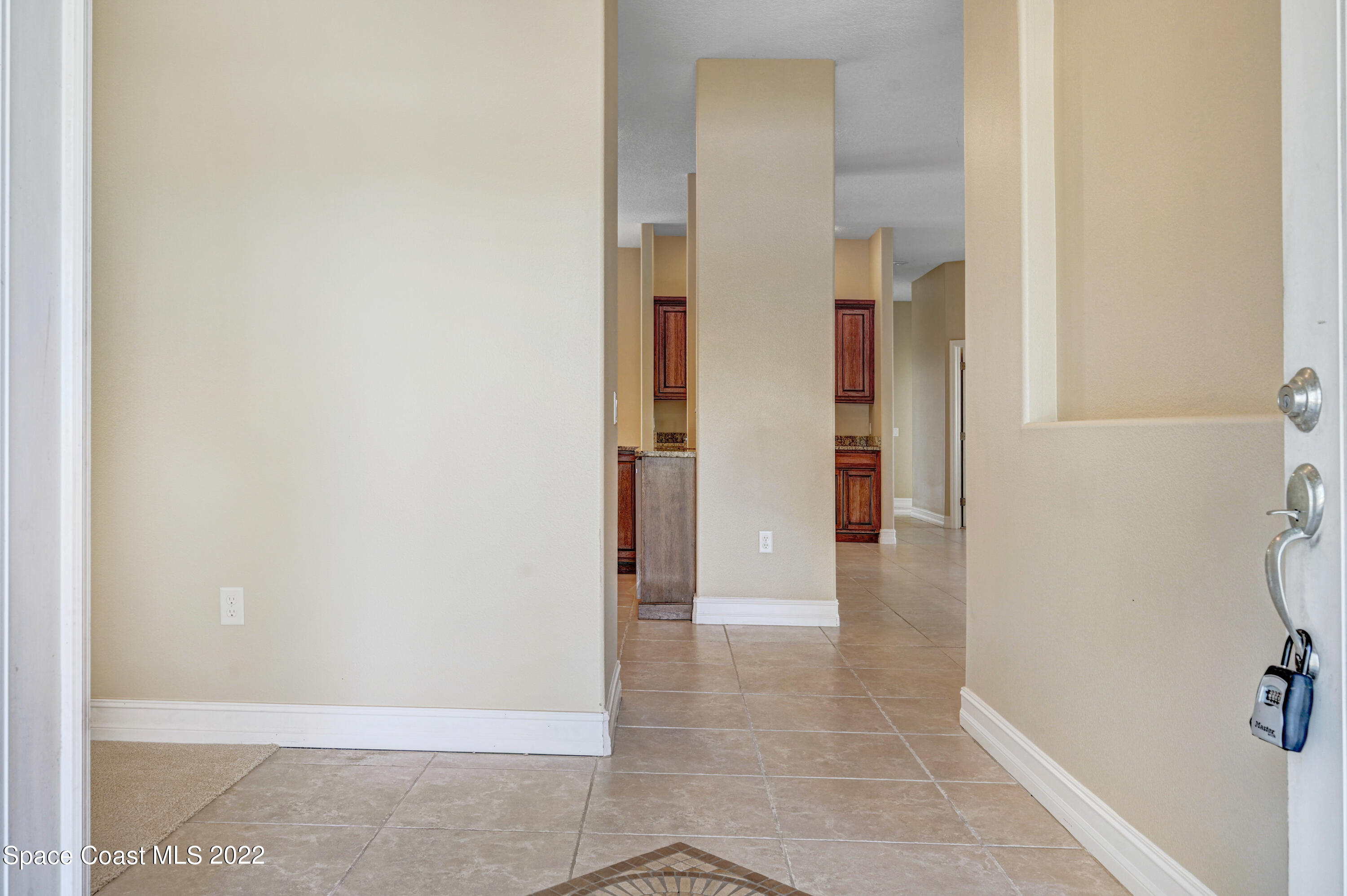 2185 Windbrook Drive Palm Bay, FL 32909 - Photo 23 of 61 a view of a bathroom with a shower