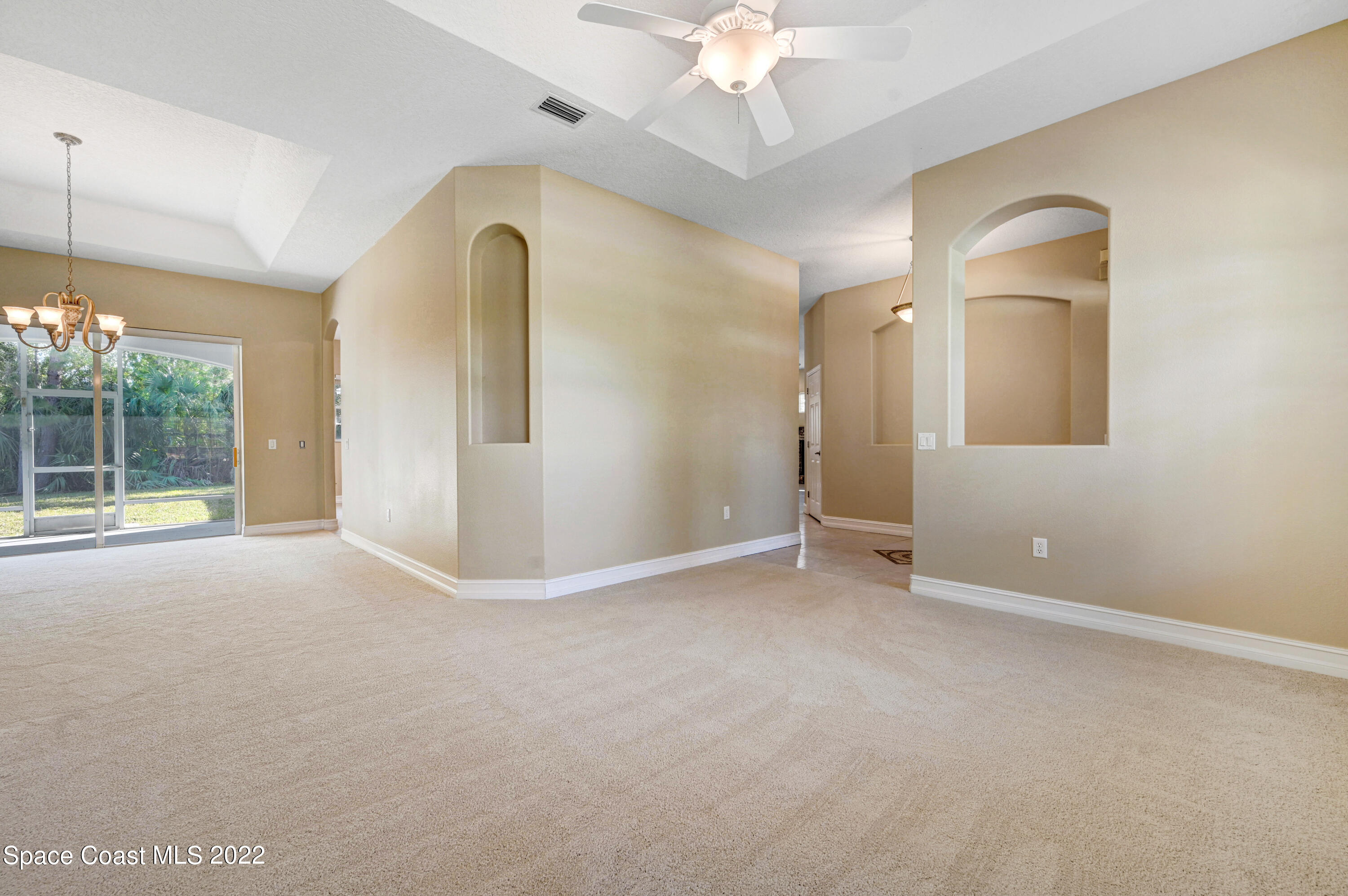 2185 Windbrook Drive Palm Bay, FL 32909 - Photo 27 of 61 a view of an empty room with a window