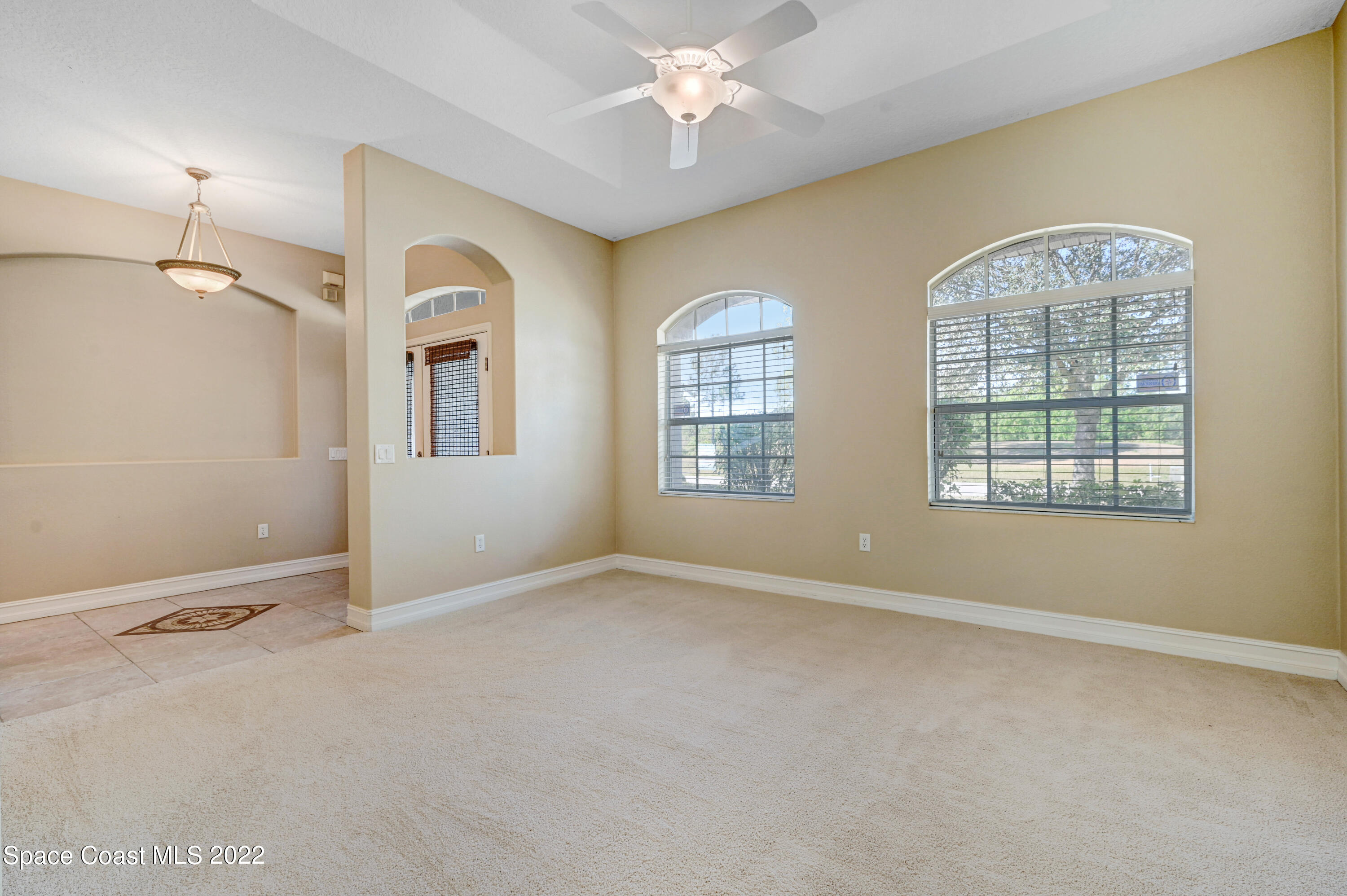 2185 Windbrook Drive Palm Bay, FL 32909 - Photo 28 of 61 a view of an empty room with a window