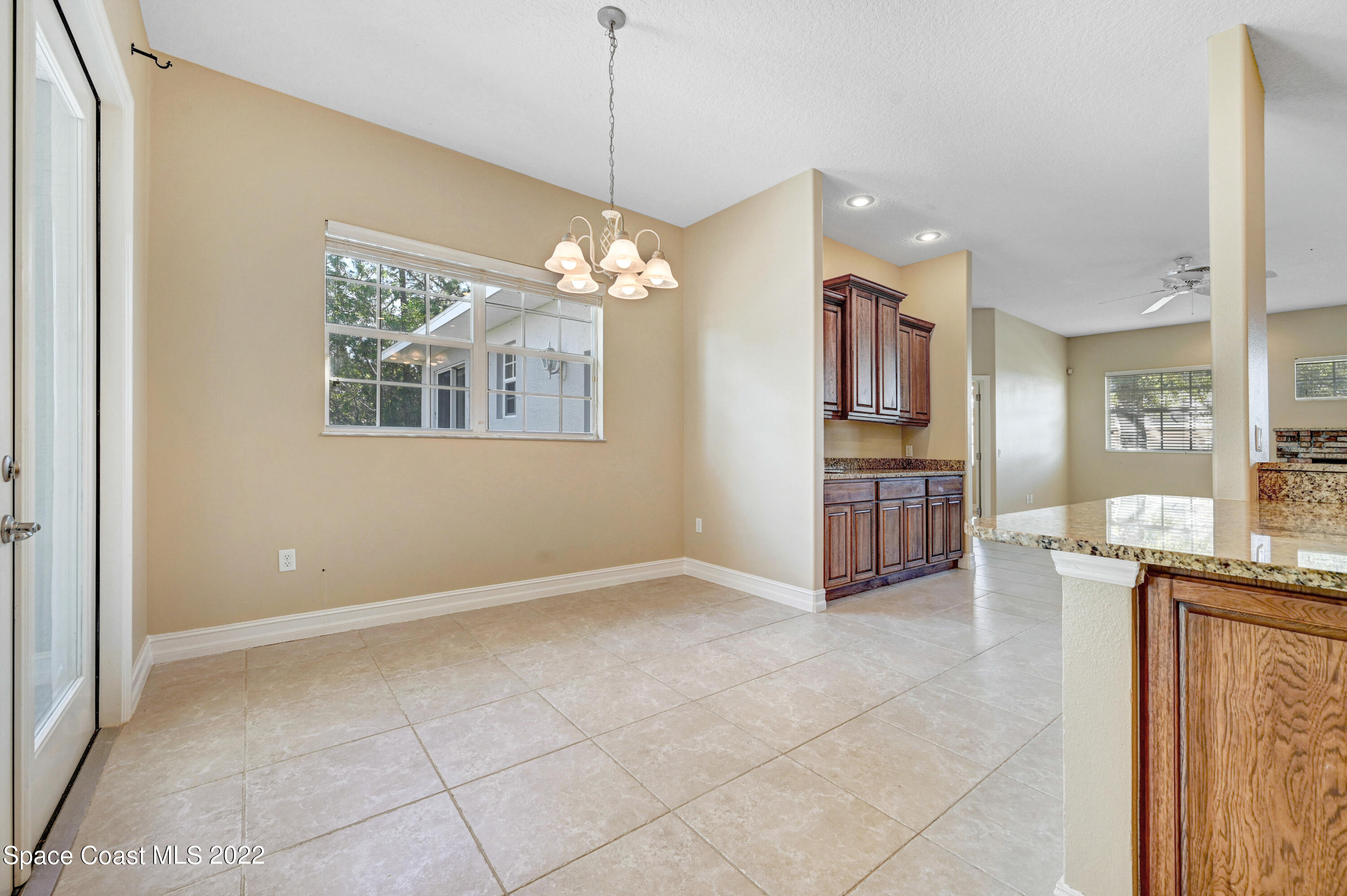 2185 Windbrook Drive Palm Bay, FL 32909 - Photo 32 of 61 a view of livingroom with kitchen