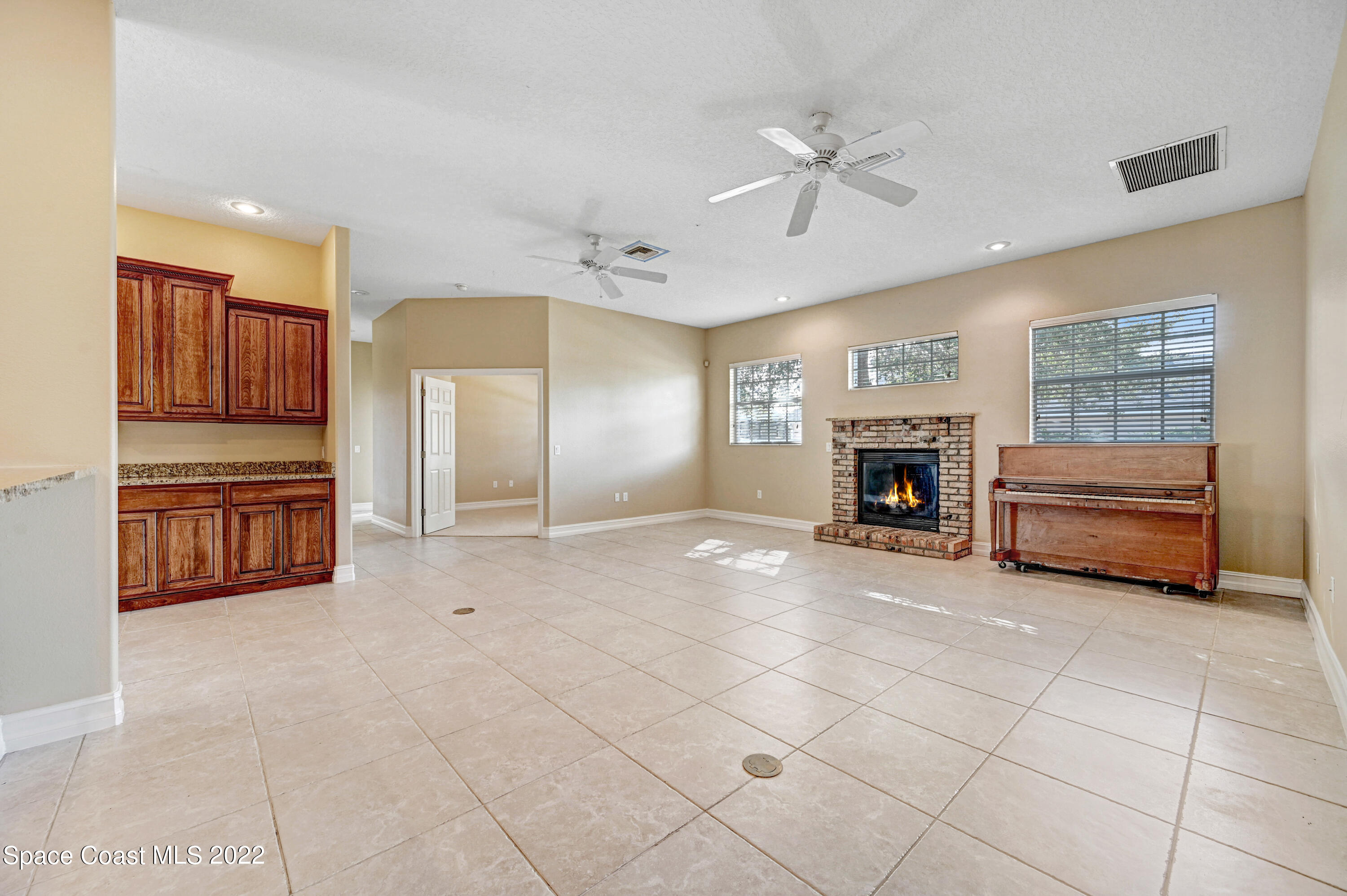 2185 Windbrook Drive Palm Bay, FL 32909 - Photo 40 of 61 a view of livingroom with furniture and chandelier fan