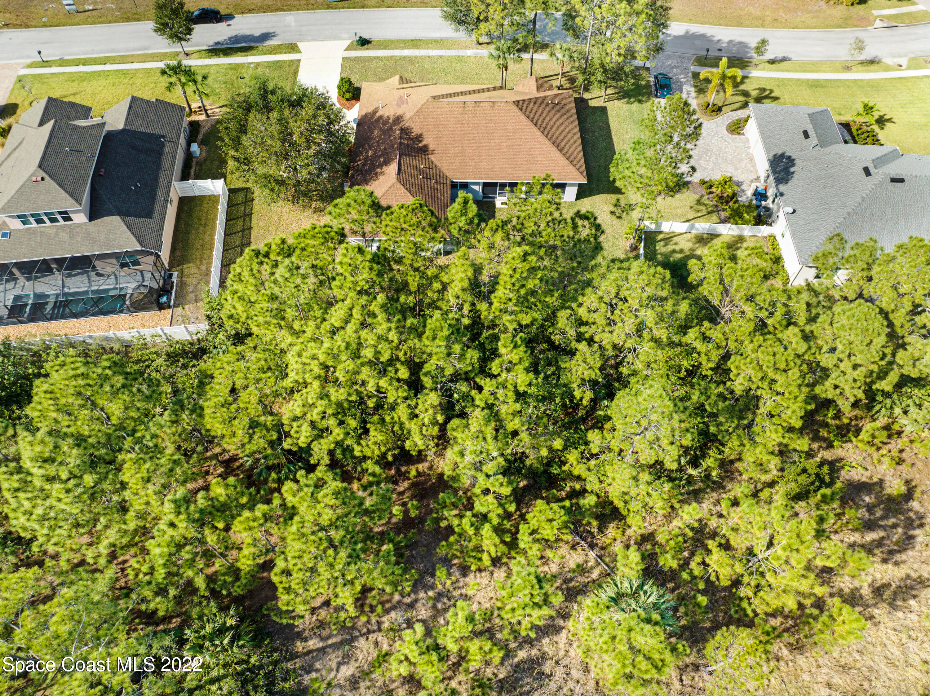 2185 Windbrook Drive Palm Bay, FL 32909 - Photo 8 of 61 an aerial view of a house with a yard swimming pool and outdoor seating