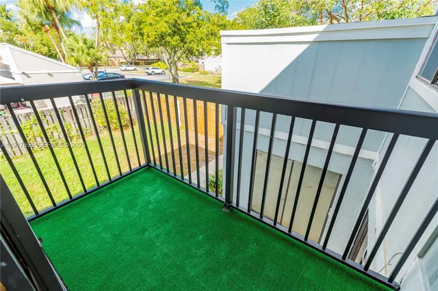 a picture of a bench in a white building