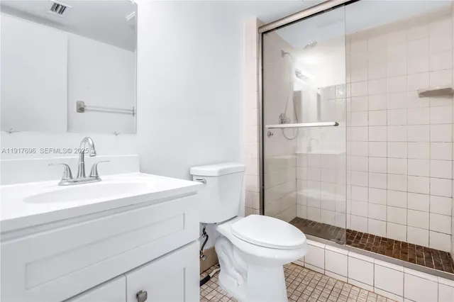 a living room with furniture a rug and a window
