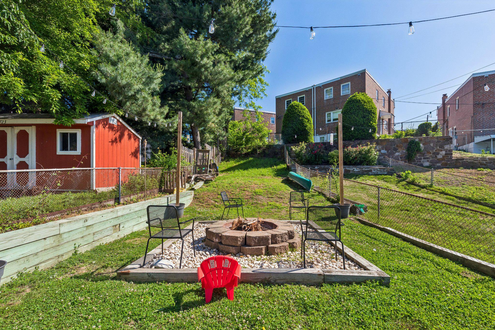 725 Hill Road Philadelphia, PA 19128 - Photo 35 of 43 a view of a backyard with plants and a patio