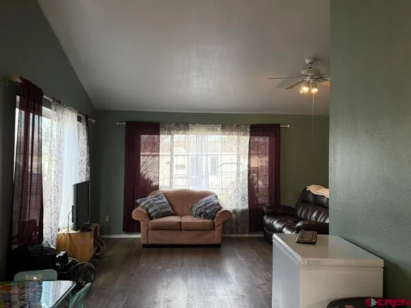a kitchen with stainless steel appliances granite countertop lots of counter top space and cabinets