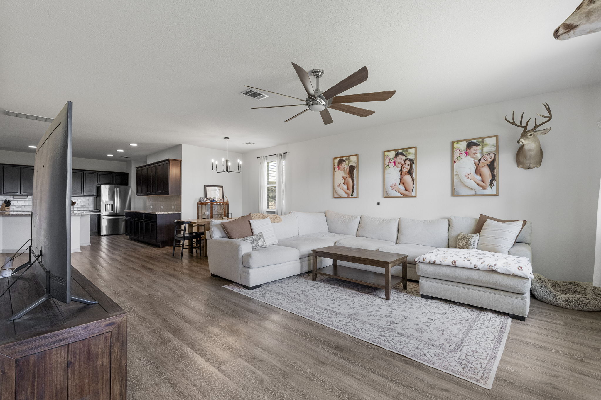 185 Struss Drive Georgetown, TX 78626 - Photo 23 of 23 An open floorplan seamlessly connects the living area and kitchen, perfect for entertaining.