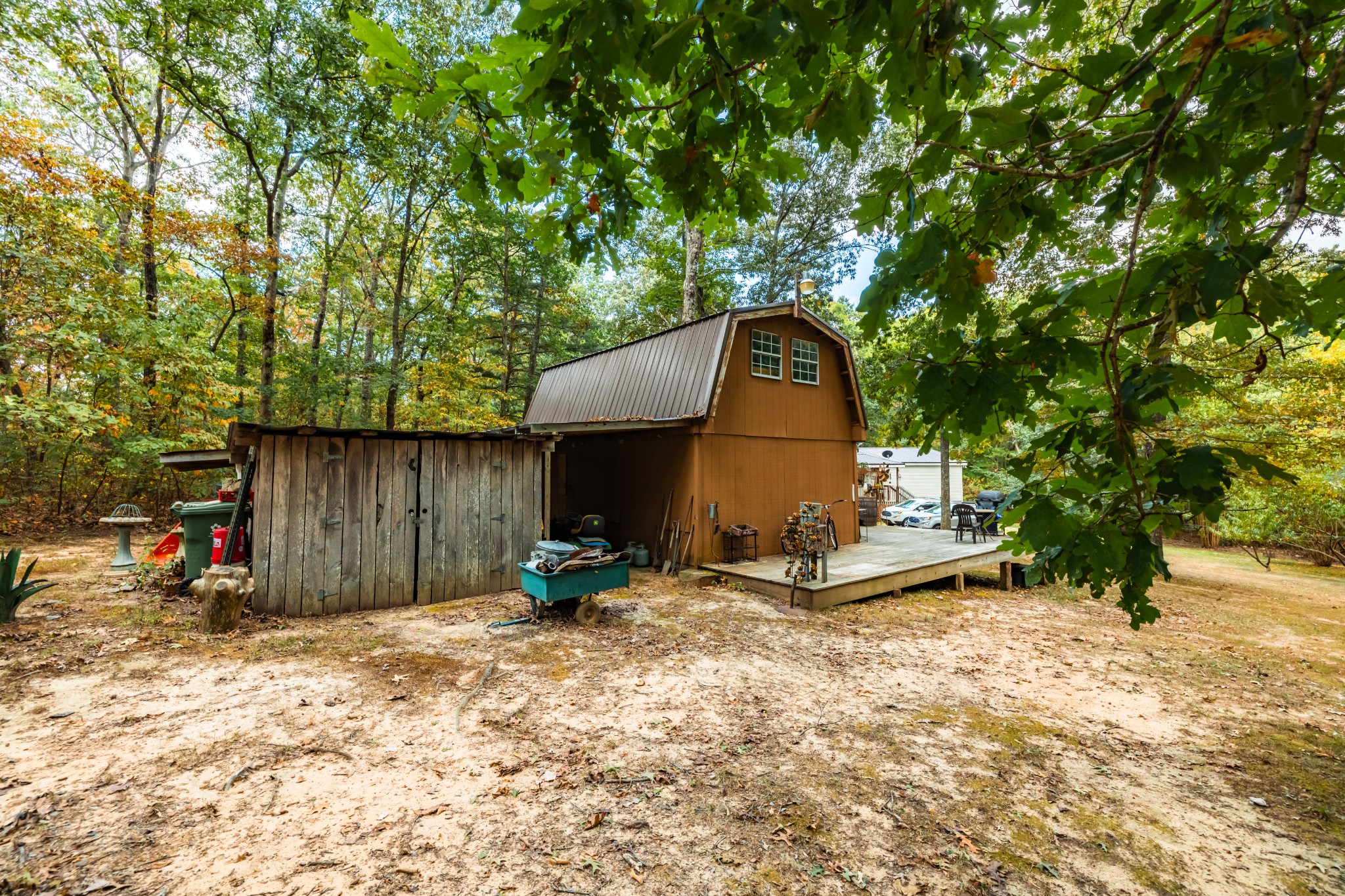 382 Locust Road Dunlap, TN 37327 - Photo 20 of 44 a backyard of a house with fire pit and chairs