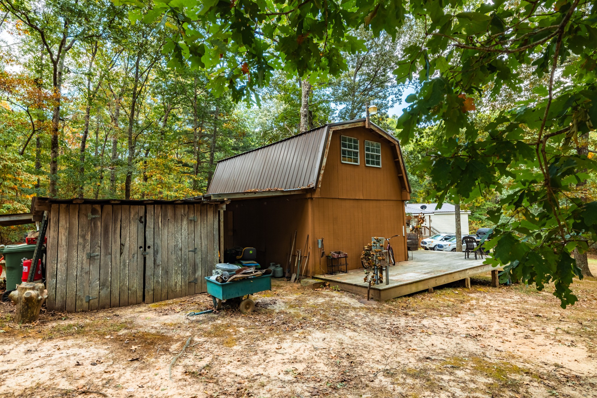 382 Locust Road Dunlap, TN 37327 - Photo 22 of 44 a view of backyard with wooden fence and a large tree