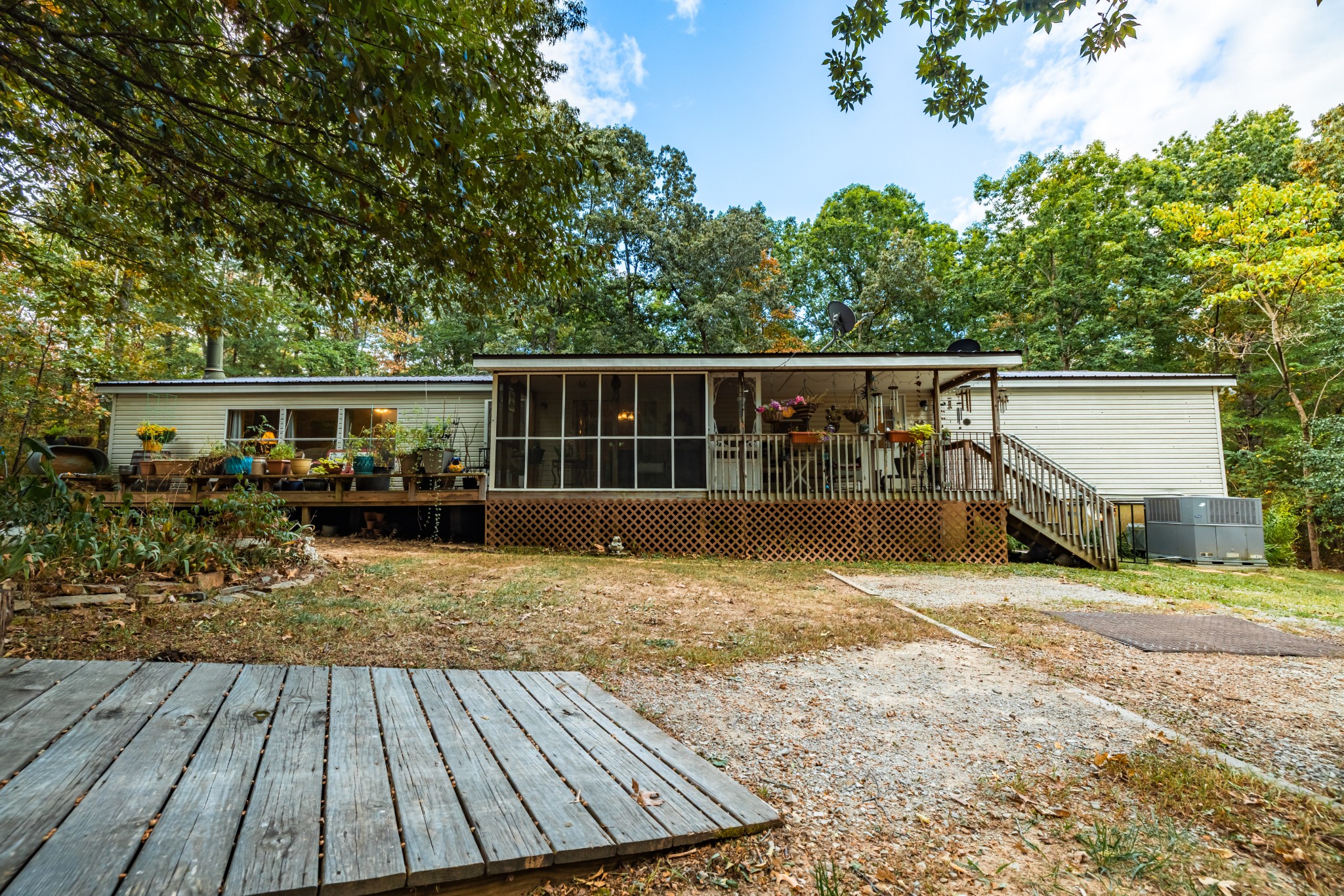 382 Locust Road Dunlap, TN 37327 - Photo 24 of 44 a view of house with swimming pool and sitting area