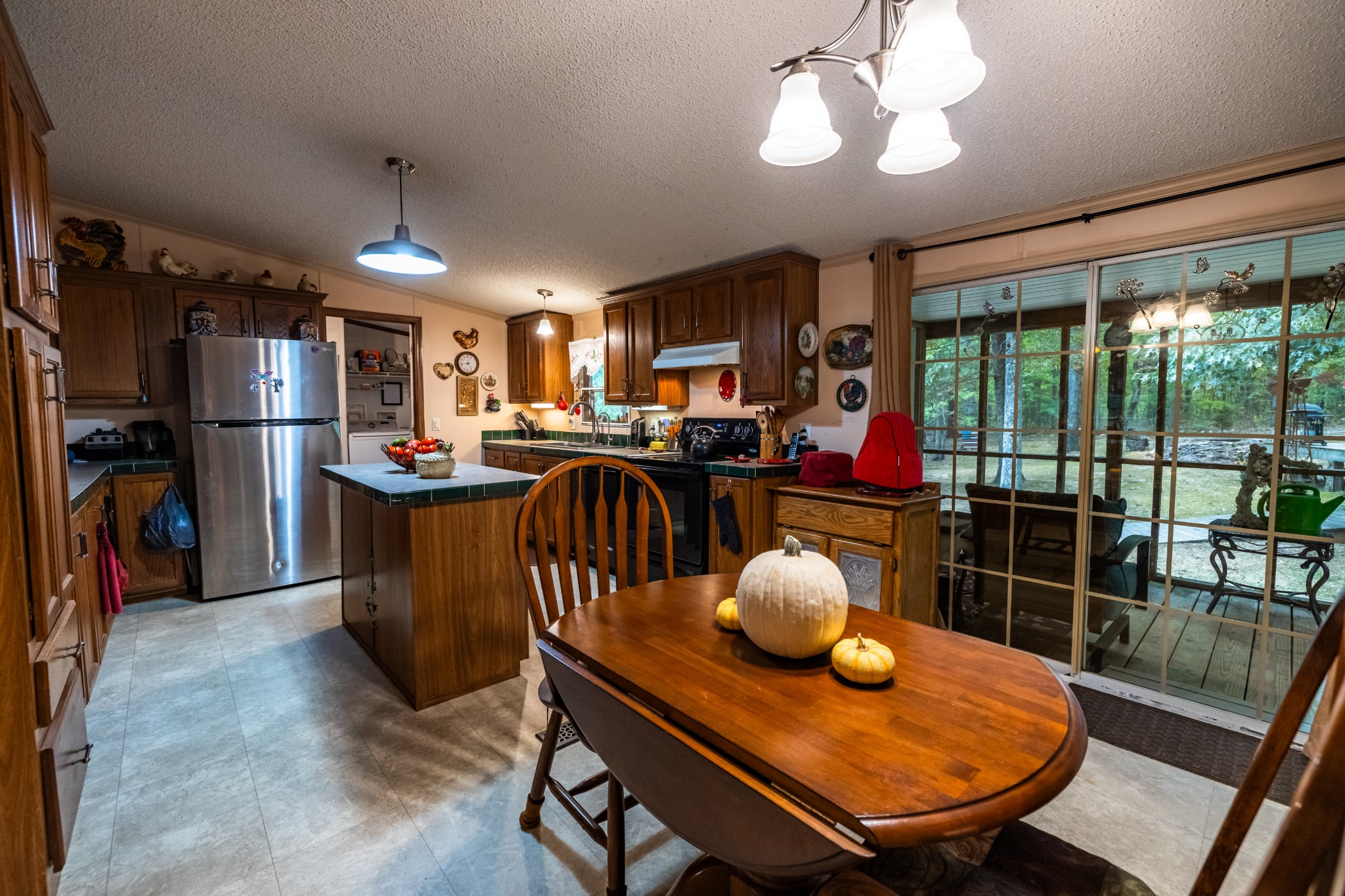 382 Locust Road Dunlap, TN 37327 - Photo 27 of 44 a living room with furniture a flat screen tv and a large window
