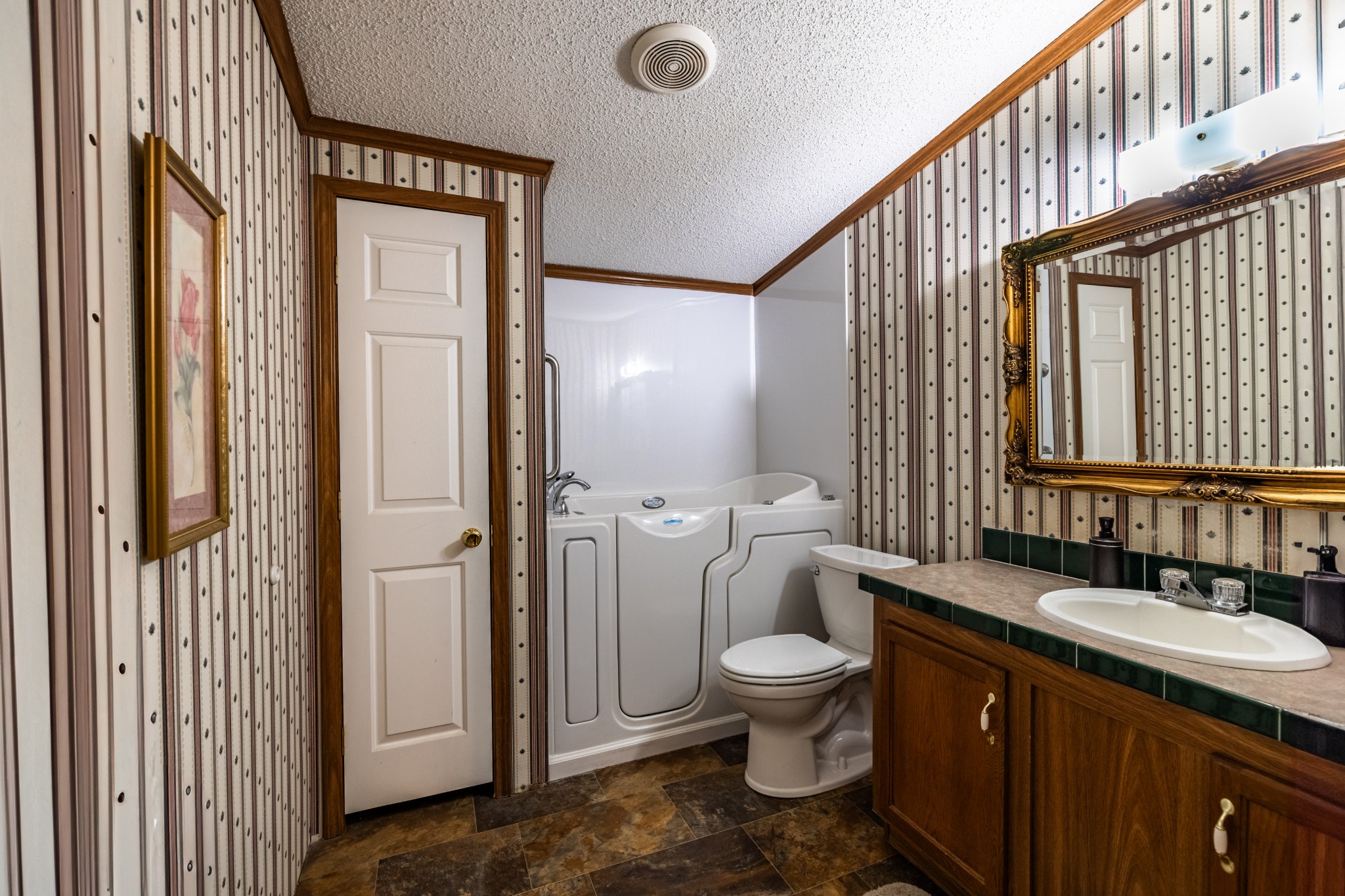 382 Locust Road Dunlap, TN 37327 - Photo 29 of 44 a bathroom with a double vanity sink toilet and shower
