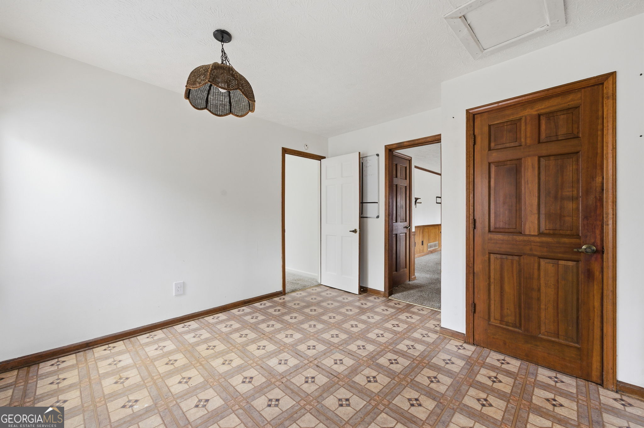 1732 Golfcrest Court Stone Mountain, GA 30088 - Photo 19 of 41 a view of a hallway with a bedroom