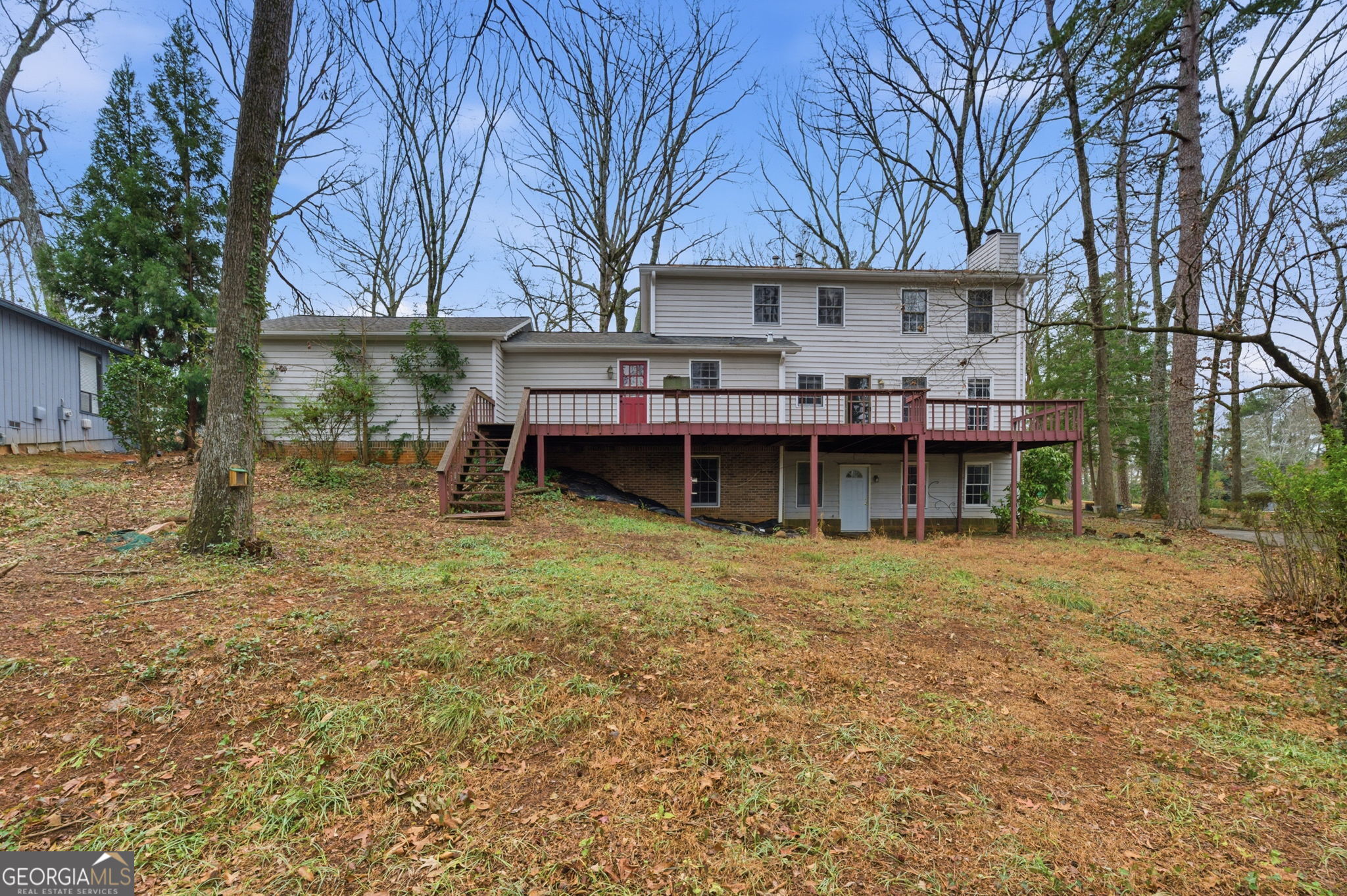1732 Golfcrest Court Stone Mountain, GA 30088 - Photo 39 of 41 a view of a house with a yard and sitting area