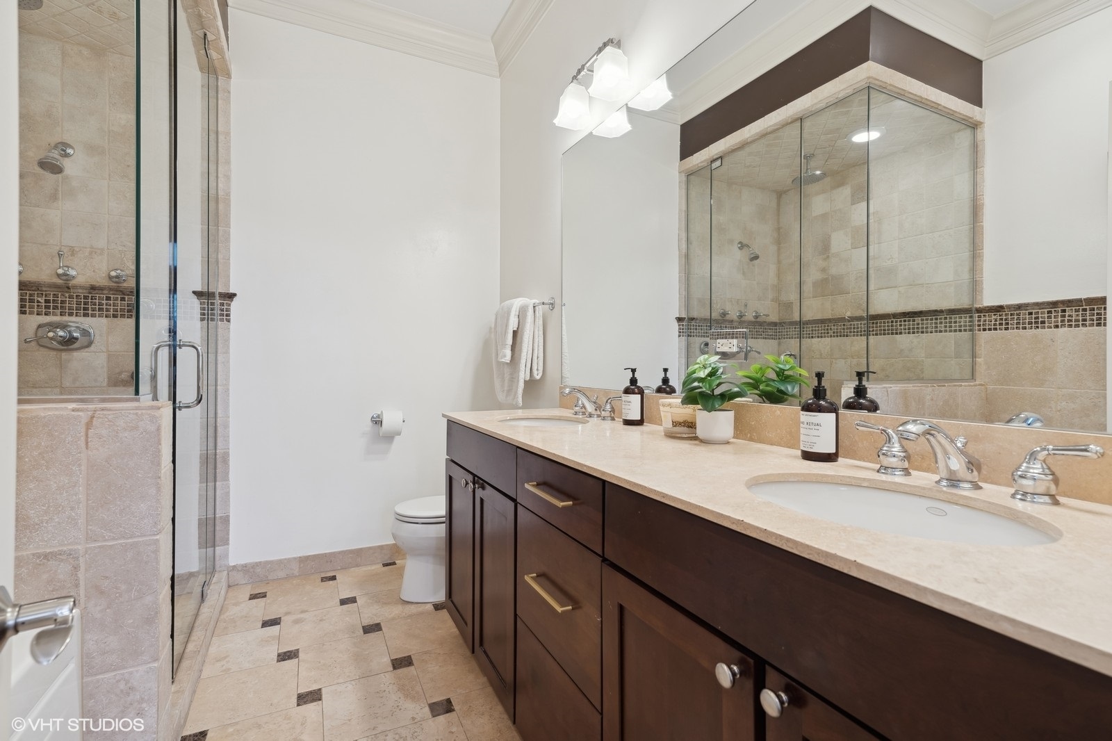 3232 North Seminary Avenue, Unit 3 Chicago, IL 60657 - Photo 12 of 22 a bathroom with a sink a double vanity and a mirror