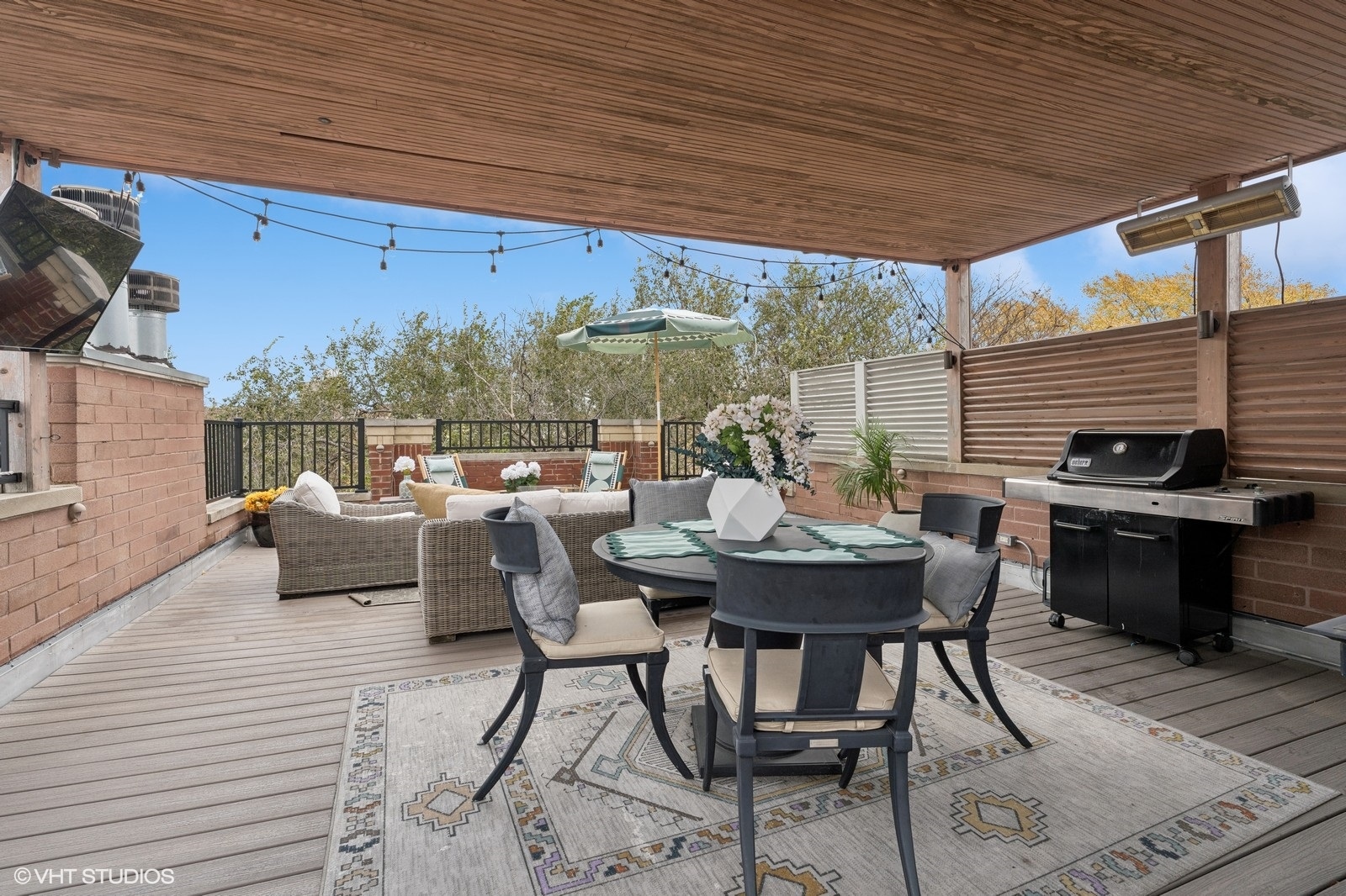 3232 North Seminary Avenue, Unit 3 Chicago, IL 60657 - Photo 18 of 22 a view of a patio with a dining table and chairs