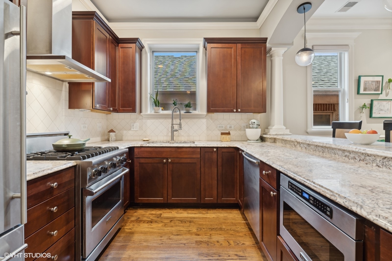 3232 North Seminary Avenue, Unit 3 Chicago, IL 60657 - Photo 7 of 22 a kitchen with stainless steel appliances granite countertop a sink stove and oven