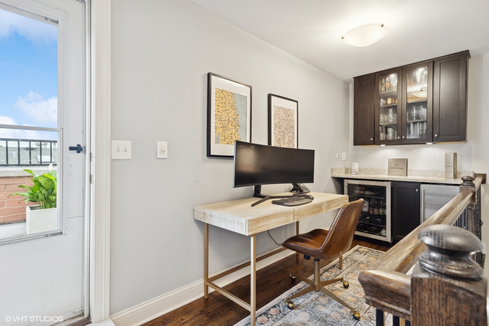 3232 North Seminary Avenue, Unit 3 Chicago, IL 60657 - Photo 9 of 22 a work room with furniture and a flat screen tv