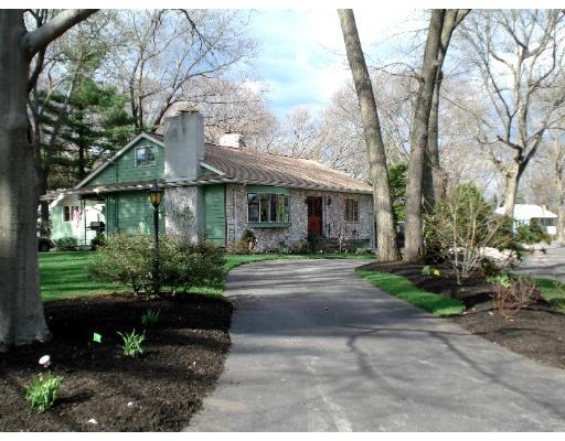 2 Nowers Road Lexington, MA 02420 - Photo 1 of 22 a front view of a house with garden