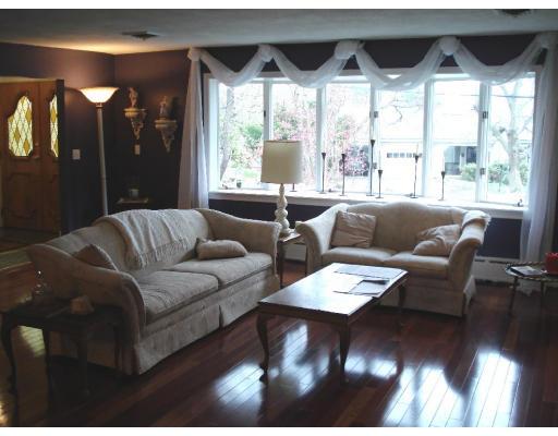 2 Nowers Road Lexington, MA 02420 - Photo 17 of 22 a living room with furniture and a large window