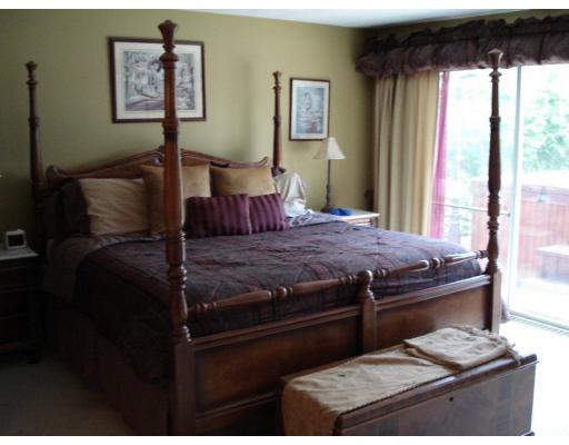 2 Nowers Road Lexington, MA 02420 - Photo 18 of 22 a bedroom with a bed and wooden floor