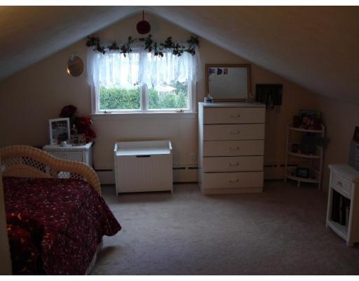 2 Nowers Road Lexington, MA 02420 - Photo 6 of 22 a bedroom with a bed and a window