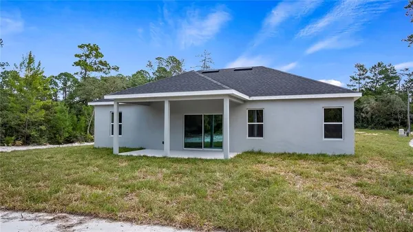 front view of house with a yard